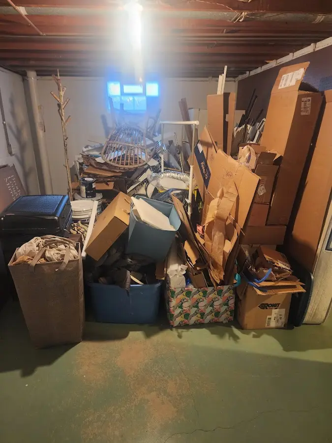 Roll-off dumpster container at job site for 6 Yard Dumpster Rental in Camp Springs